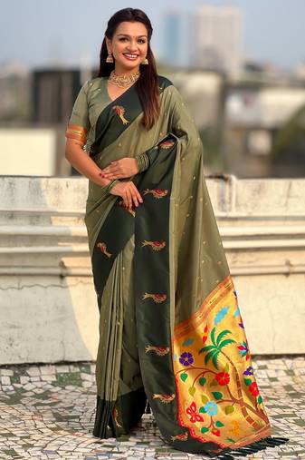 Green color soft silk woven deisgner partywear saree