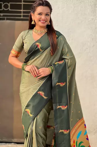 Green color soft silk woven deisgner partywear saree