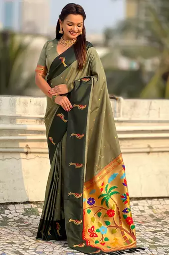 Green color soft silk woven deisgner partywear saree