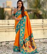 Orange color beautiful  woven lotus meenakari designer graceful ethnic saree