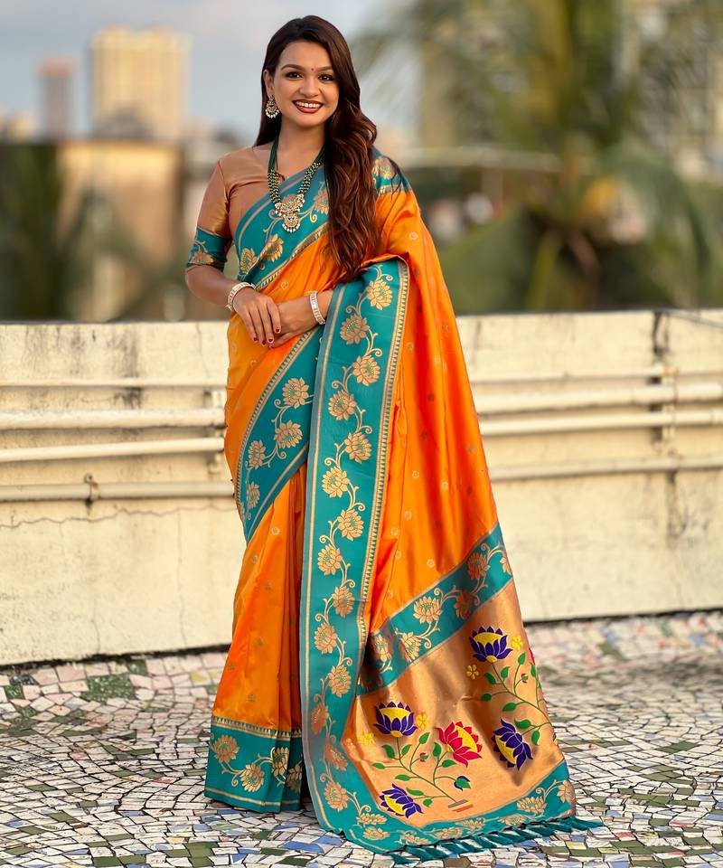 Orange color beautiful  woven lotus meenakari designer graceful ethnic saree