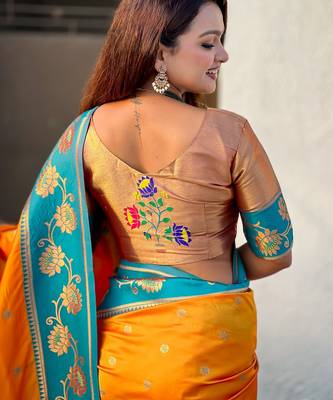 Orange woven lotus meenakari graceful ethnic saree 5