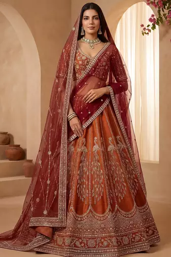 Stylish Rust Orange Hand Work Bridal Lehenga Choli With Double Dupatta