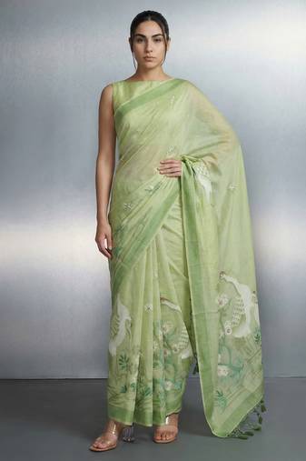 Light green woven floral & peacock motifs work silk blend fabric traditional elegant style