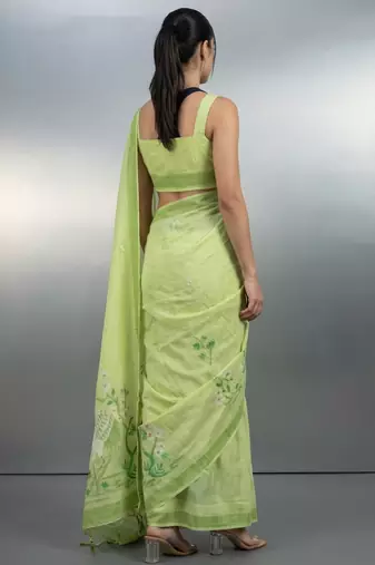 Light green woven floral & peacock motifs work silk blend fabric traditional elegant style