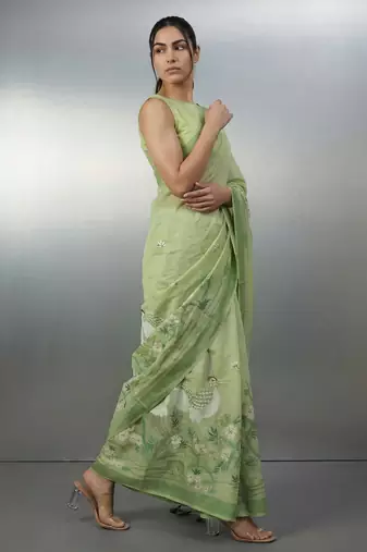 Light green woven floral & peacock motifs work silk blend fabric traditional elegant style