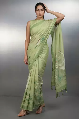 Light green woven floral & peacock motifs work silk blend fabric traditional elegant style