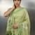 Light green woven floral & peacock motifs work silk blend fabric traditional elegant style
