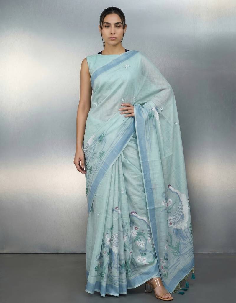 Sea green woven floral & peacock motifs work silk blend fabric traditional elegant style