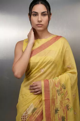 Yellow woven floral & peacock motifs work silk blend fabric traditional elegant style