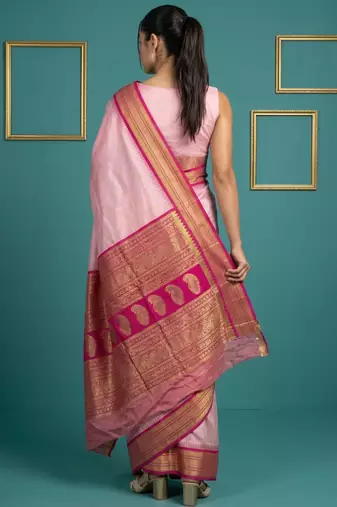Baby pink border woven zari border & buti work silk blend fabric traditional festive style
