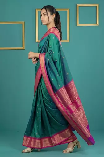 Teal border woven zari border & buti work silk blend fabric traditional festive style