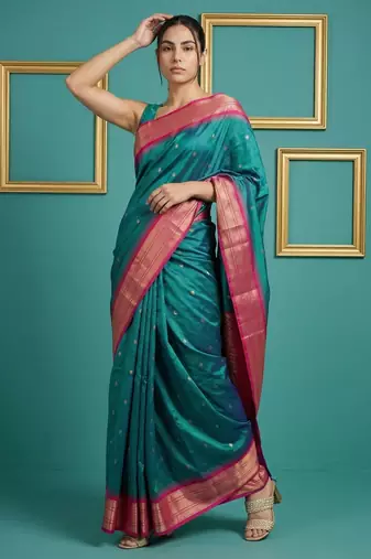 Teal border woven zari border & buti work silk blend fabric traditional festive style