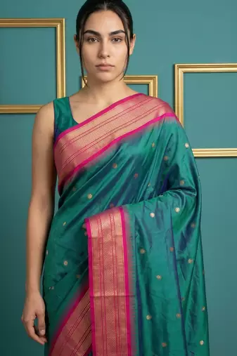 Teal border woven zari border & buti work silk blend fabric traditional festive style