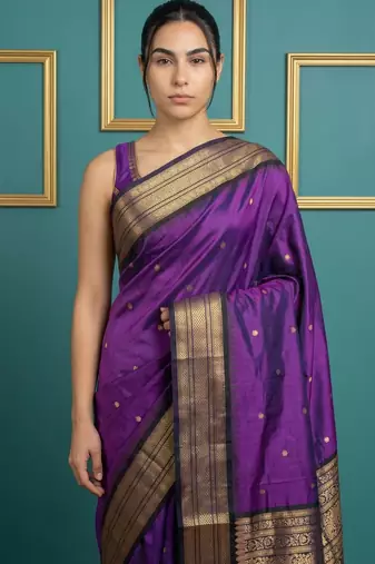 Purple border woven zari border & buti work silk blend fabric traditional festive style