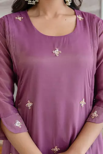 Stylish pink ethnic kurta set with heavy floral embroidery