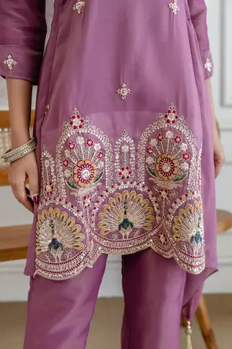 Stylish pink ethnic kurta set with heavy floral embroidery