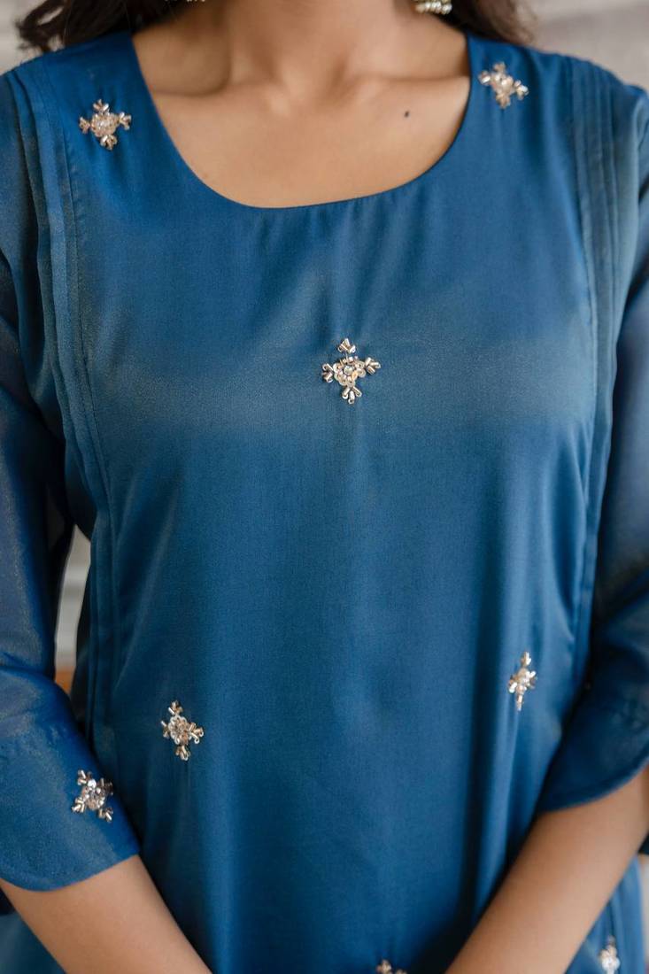 Stylish blue ethnic kurta set with heavy floral embroidery