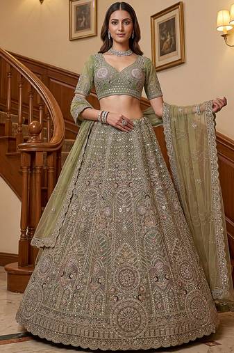 Ravishing Green Heavy Embroidered Net Evening Wear Lehenga Choli