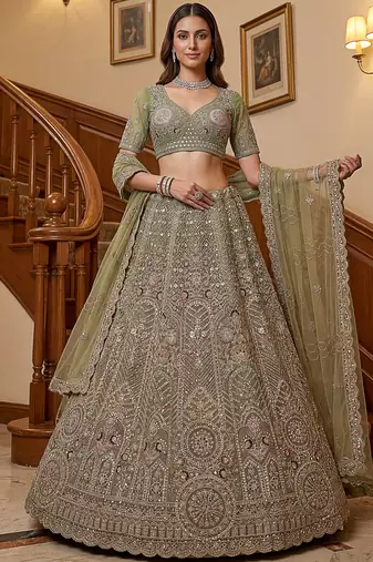 Ravishing Green Heavy Embroidered Net Evening Wear Lehenga Choli