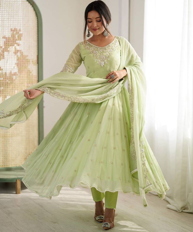 Pista color faux georgette embroidery work wedding wear gown