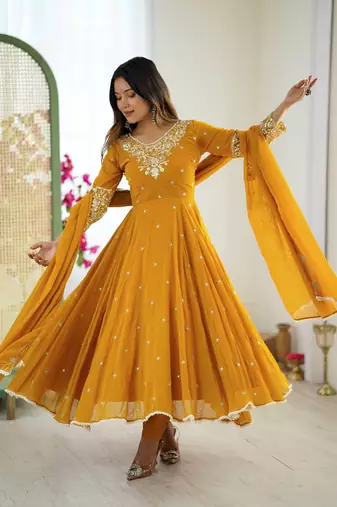 Yellow color faux georgette embroidery work wedding wear gown