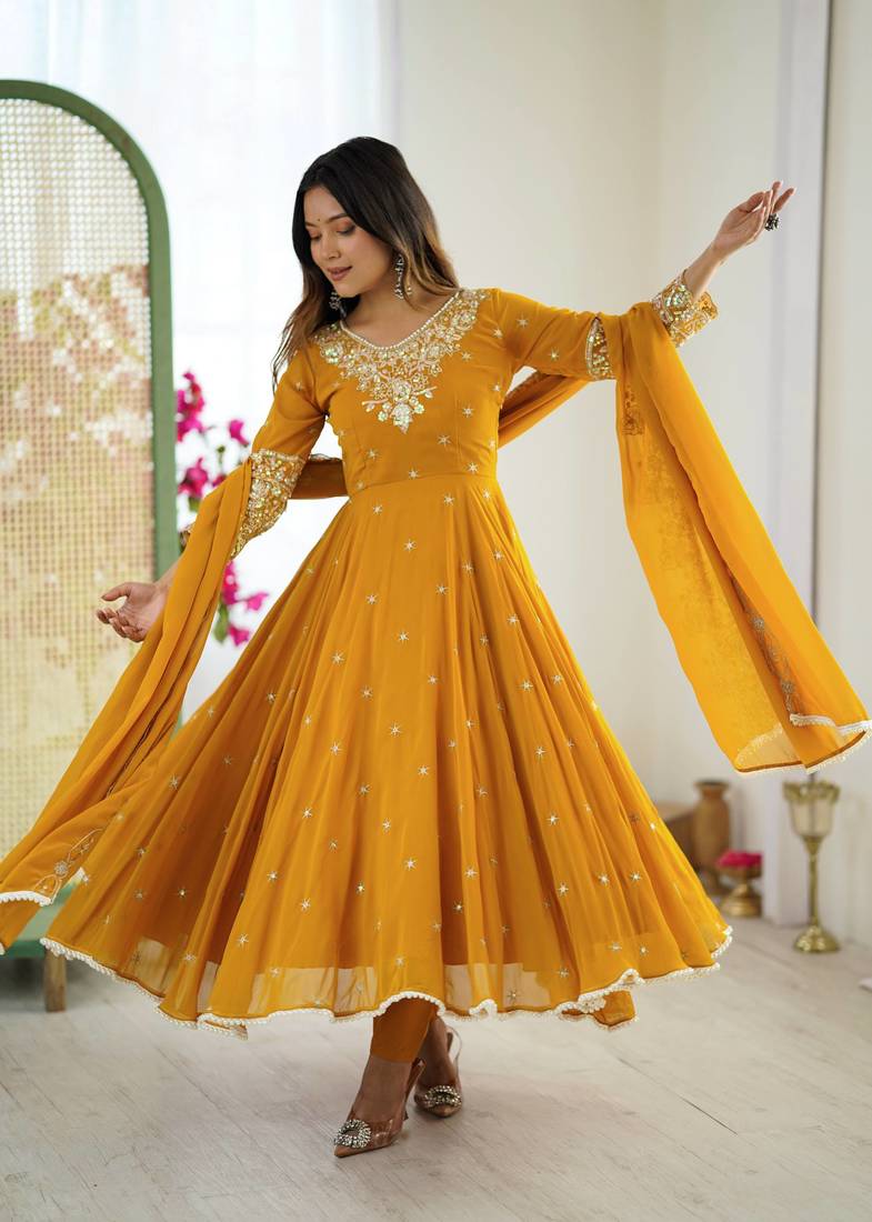 Yellow color faux georgette embroidery work wedding wear gown