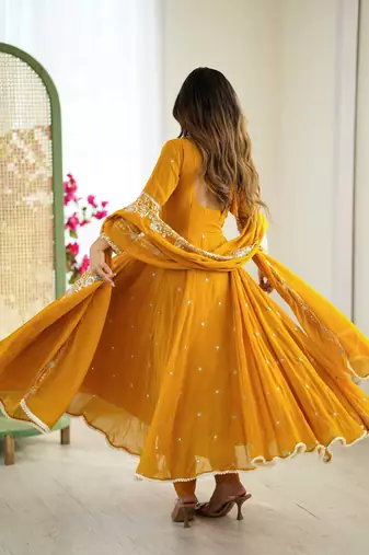 Yellow color faux georgette embroidery work wedding wear gown