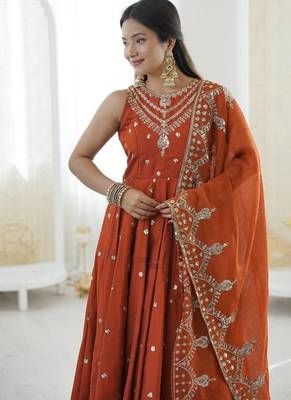 Orange color roman silk embroidery work party wear gown 1