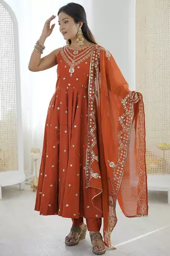 Orange color roman silk embroidery work party wear gown