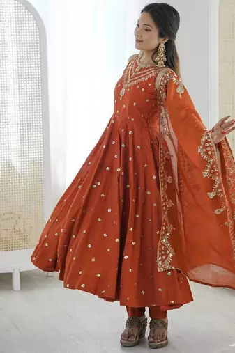 Orange color roman silk embroidery work party wear gown
