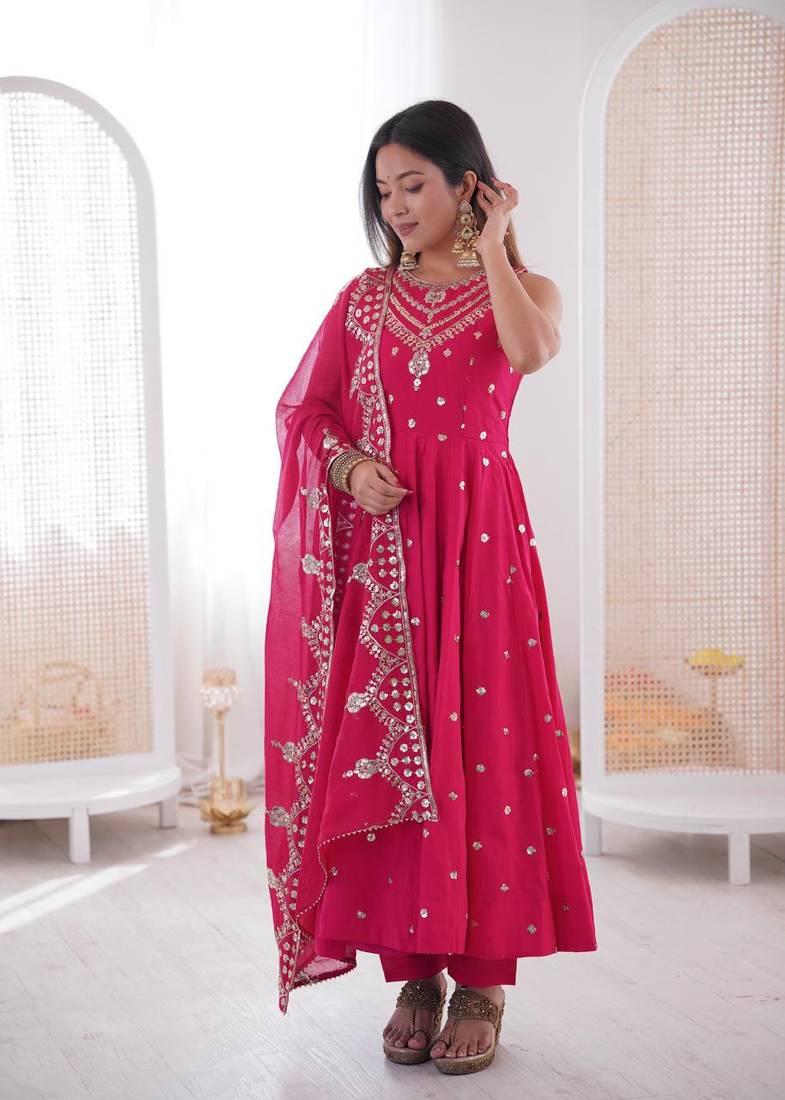 Pink color roman silk embroidery work  party wear gown