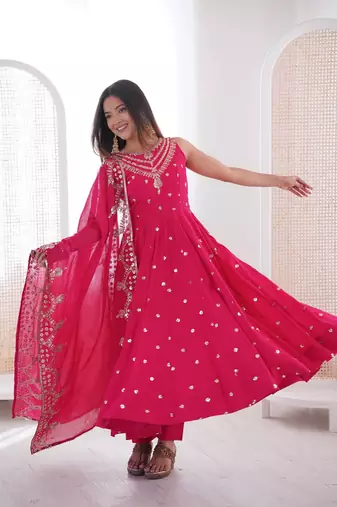 Pink color roman silk embroidery work party wear gown