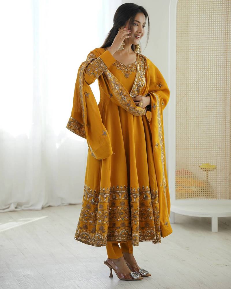 Yellow roman silk embroidery work party wear long gown