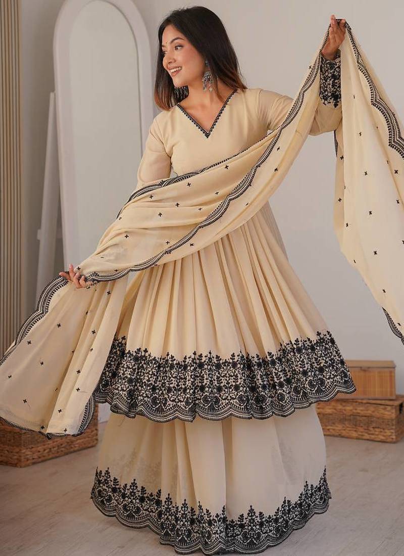 Cream color faux georgette embrodiery work party wear sharara set