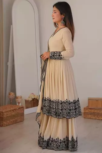 Cream color faux georgette embrodiery work party wear sharara set
