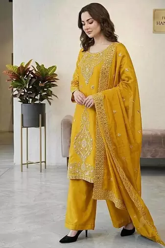 Yellow color gimmychu silk embroidery work wedding wear salwar suit