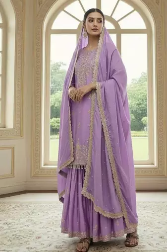 Lavender color chinnon silk embroidery work wedding wear salwar suit