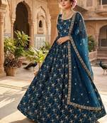 Orange color fendy silk heavy embroidery work wedding wear long gown