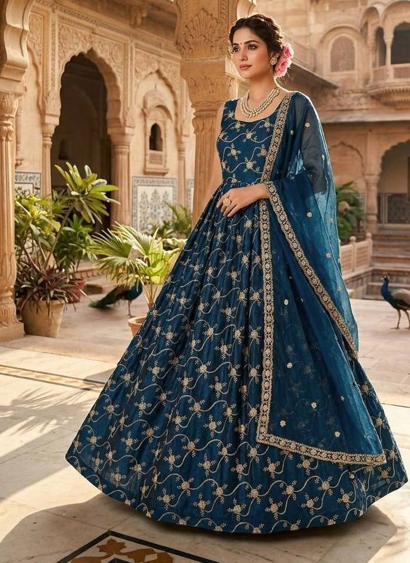 Orange color fendy silk heavy embroidery work wedding wear long gown