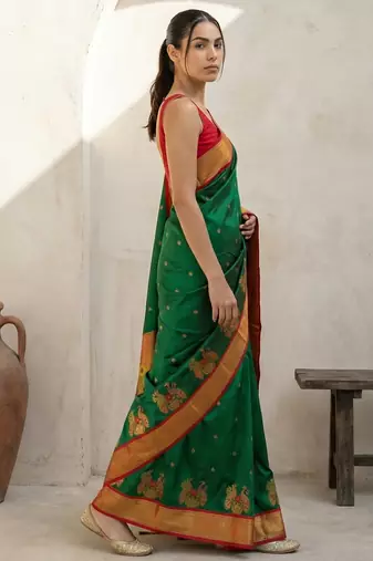 Green woven zari buti & floral motifs work silk blend fabric traditional festive style