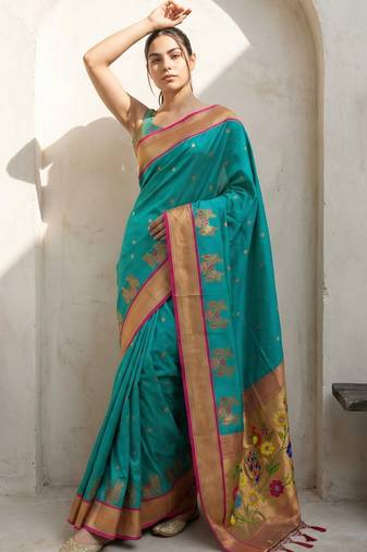Light green woven zari buti & floral motifs work silk blend fabric traditional festive style