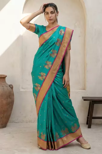 Light green woven zari buti & floral motifs work silk blend fabric traditional festive style