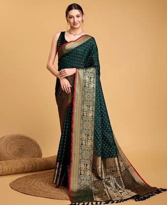 Green woven embellished self design silk blend banarasi saree with blouse 1