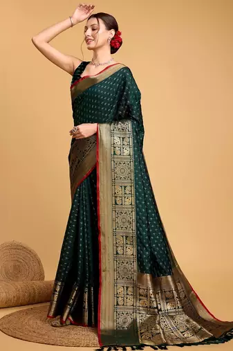 Green woven embellished self design pure silk banarasi saree with blouse