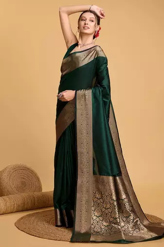 Green woven self design embellished pure silk kanjivaram saree with blouse