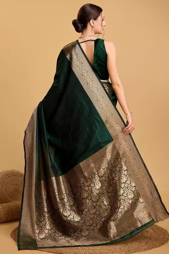 Green woven self design embellished pure silk kanjivaram saree with blouse