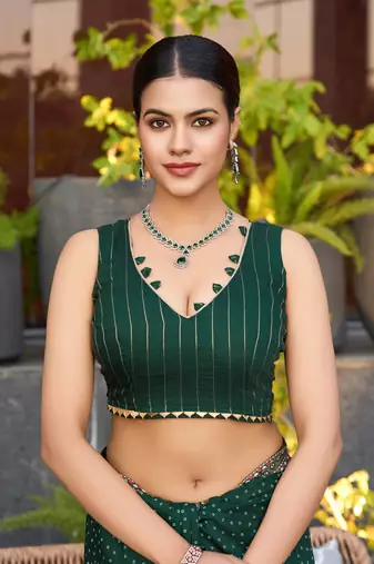 Dark green printed woven cotton silk bandhani saree with blouse