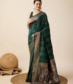 Green woven embellished self design pure silk kanjivaram saree with blouse