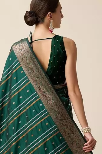 Green woven embellished self design pure silk kanjivaram saree with blouse